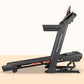 ProForm Carbon Pro 9000 black treadmill with orange accents and digital display on tan background