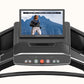 ProForm Carbon Pro 9000 treadmill with black frame, dual handrails, touchscreen display showing fitness video, and control co