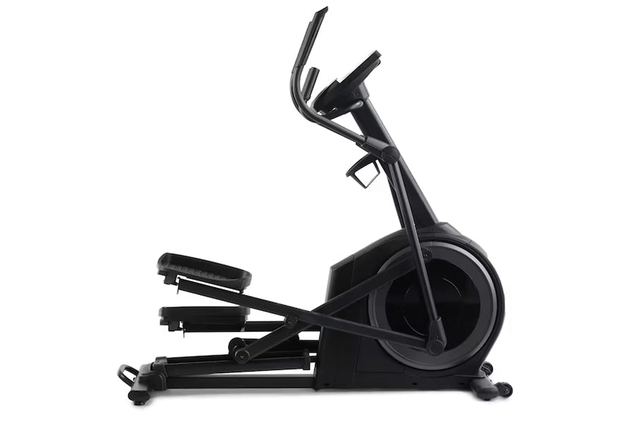 Black elliptical machine with curved handlebars and pedal base on white background