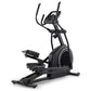 Black elliptical exercise machine with curved handles, digital display console, and foot pedals on white background