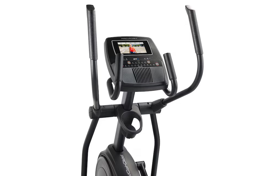 Proform Plus Carbon E7 elliptical machine with black frame, curved handles, and digital console displaying workout metrics on