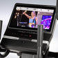ProForm Pro HIIT H14 elliptical with black frame, dual handles, touchscreen display showing workout class, and performance me