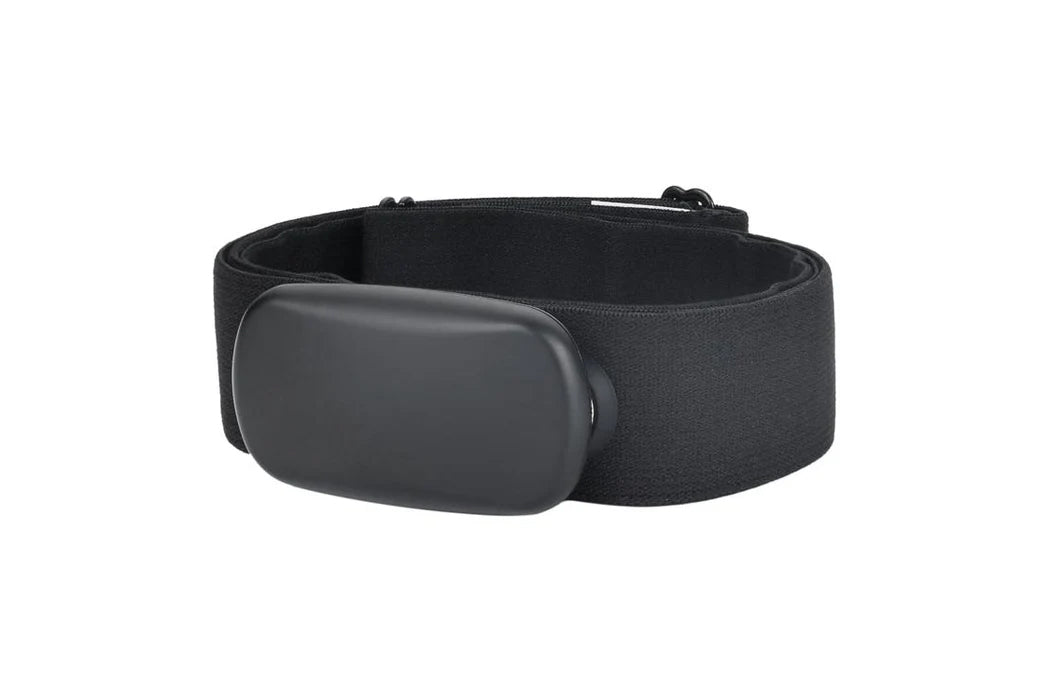 Black fabric armband with rounded matte black buckle, flat lay on white background