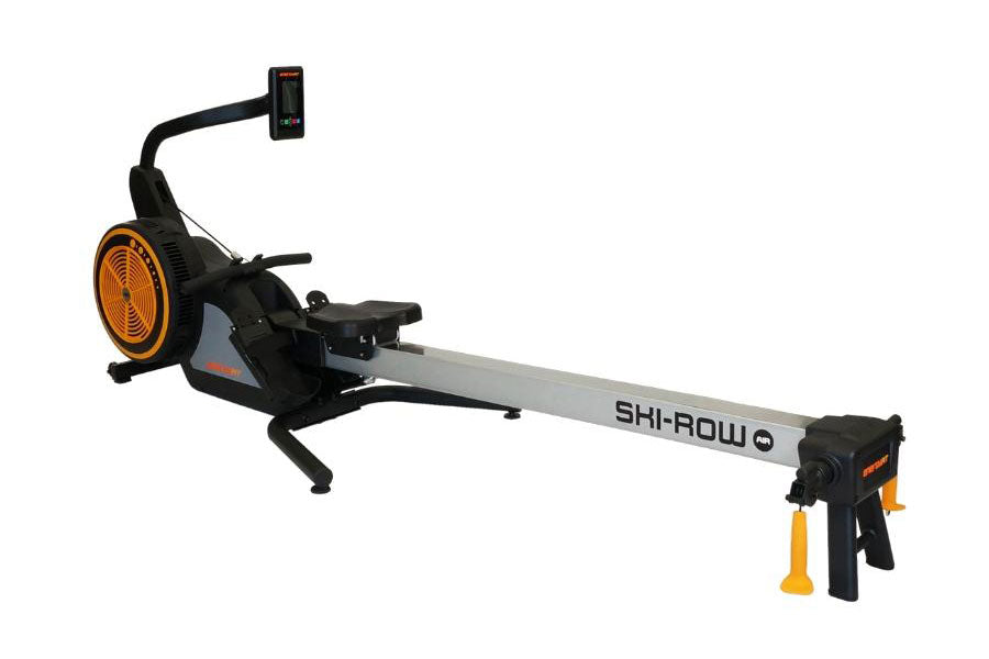 Shi-row air rowing machine with orange fan wheel, black seat, gray rail, and digital monitor on white background