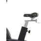Exercise bike seat and upright post with adjustable height markings, silver and black finish on white background