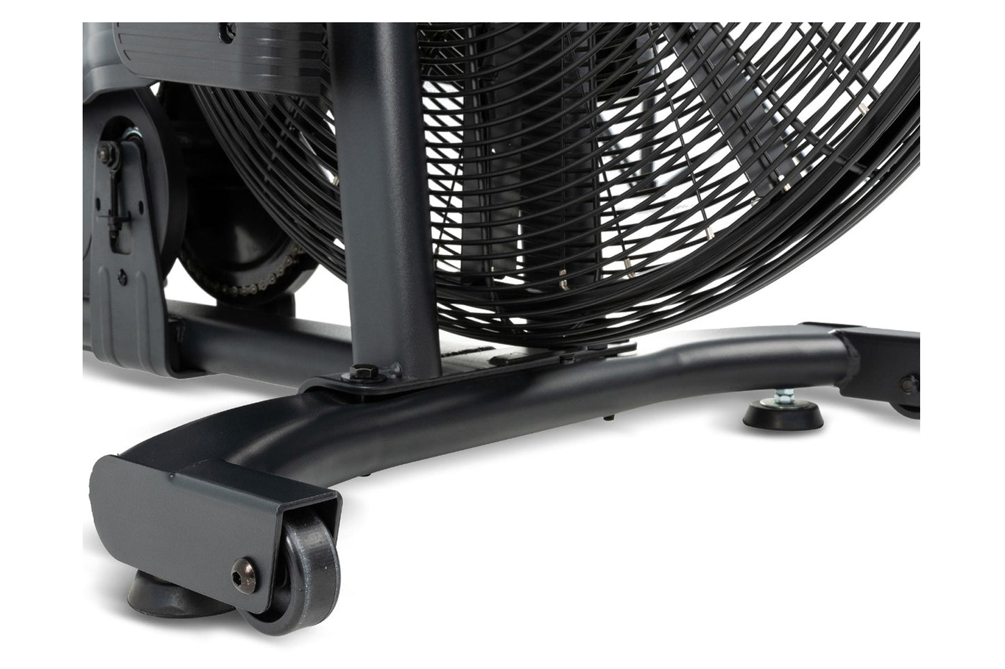 Black stationary exercise bike with curved frame, ribbed fan wheel cage, and rolling casters on white background