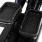 Black hexagonal-patterned foot pedals on Spirit CE1000ENT elliptical machine, shown on white background