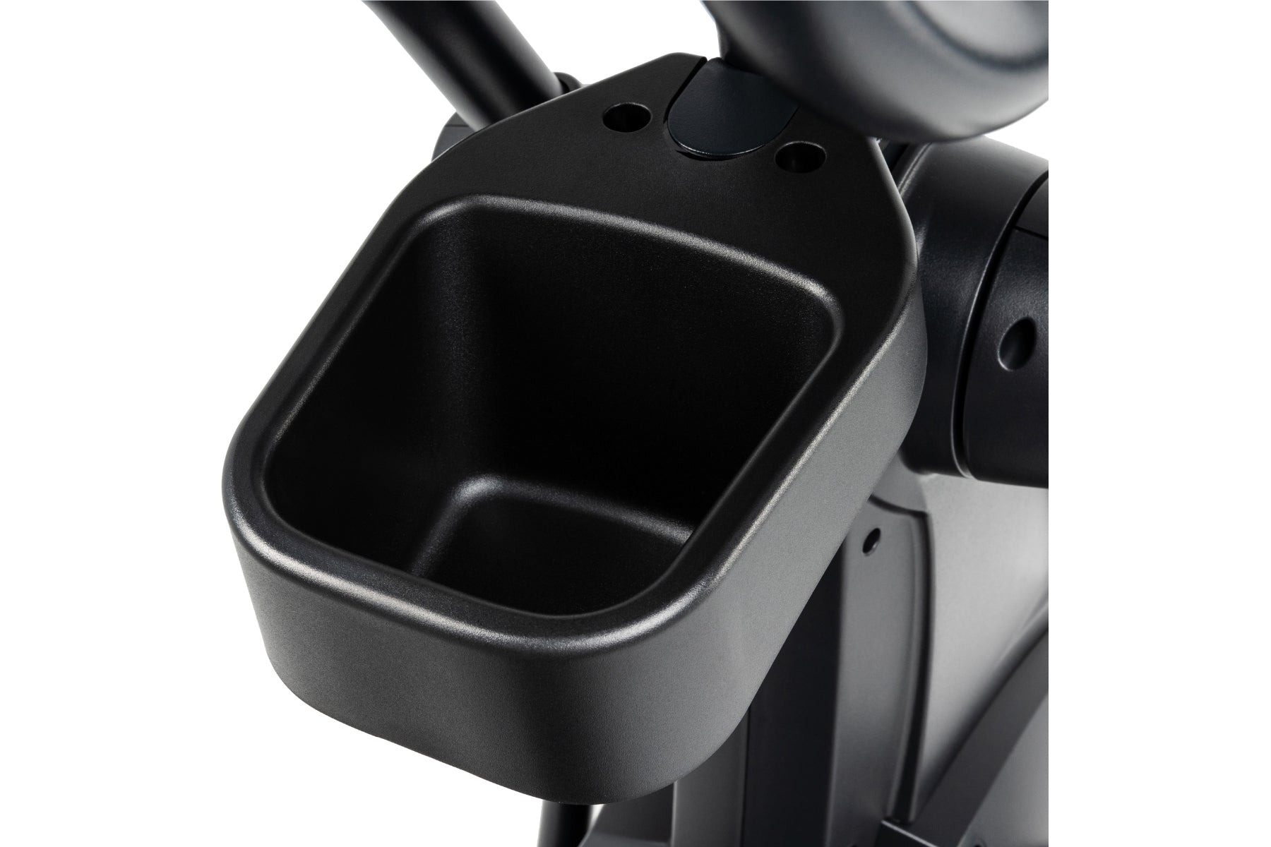 Black cup holder attachment on Spirit CE800 elliptical machine, close-up detail view