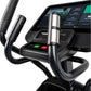 Black and silver elliptical machine with digital touchscreen display, handlebar controls, and stainless steel accents on whit