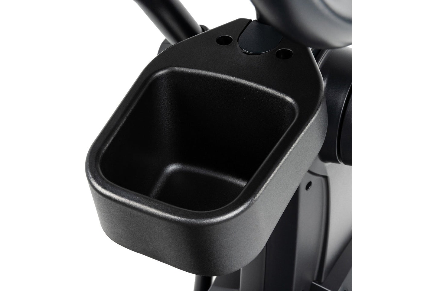 Black cup holder attachment mounted on elliptical machine handlebar