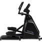 Black Spirit CE900 elliptical machine with dual handles and foot pedals on white background