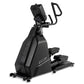 Black Spirit CE900 elliptical machine with padded seat, digital display console, and D-shaped handlebars on white background