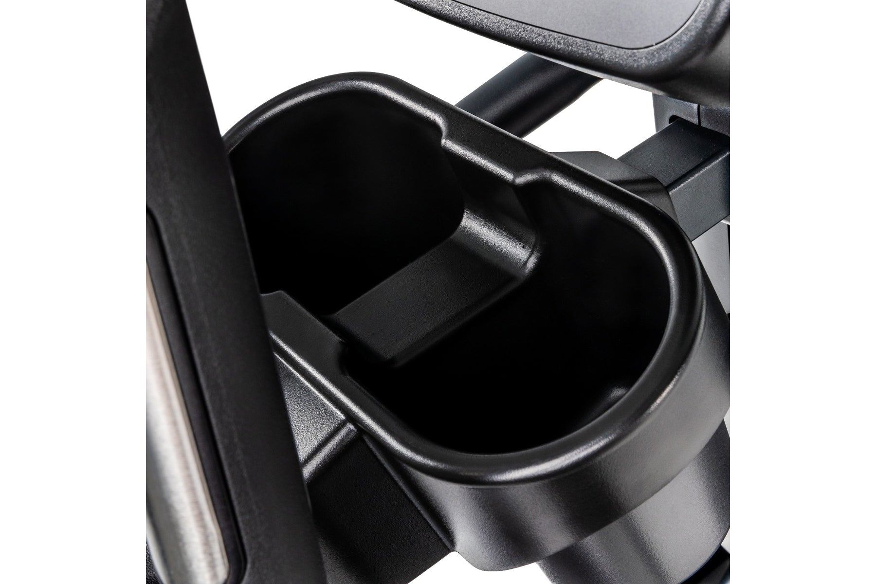 Black cup holder attached to elliptical machine frame with mounting bracket