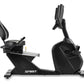 Spirit CR800 black recumbent exercise bike with padded seat, backrest, and digital console on white background