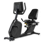 Spirit CR800 black recumbent exercise bike with digital display console and padded seat on white background