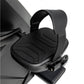 Black pedal with textured ribbed surface and adjustable foot strap on stationary bike, front view