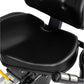 Black leather seat and backrest on recumbent exercise bike with yellow resistance lever and chrome handlebar grip visible