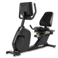 Spirit CR800ENT recumbent exercise bike with black frame, padded seat and backrest, digital display console, and foot pedals 