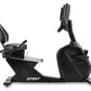 Spirit CR800ENT black recumbent exercise bike with padded seat, adjustable backrest, and tablet holder on white background