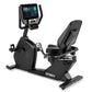 Spirit CR800ENT black recumbent exercise bike with digital touchscreen console, padded seat, and foot pedals on white backgro