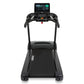 Spirit CT850ENT black treadmill with digital touchscreen console, dual handles, and cushioned running deck on white backgroun