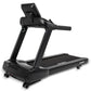Black Spirit commercial treadmill with wide running deck, dual uprights, tablet holder, and digital display console on white 