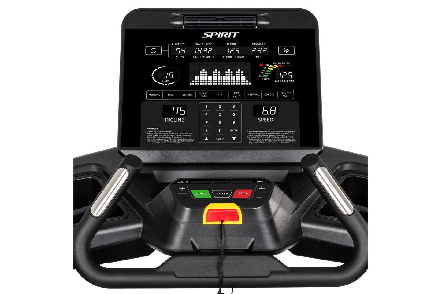 Spirit CT900 treadmill console displaying metrics including watts, heart rate, and speed, with black handrails and control bu