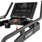 Spirit CTSBS900 slat belt sled treadmill with black frame, digital console displaying workout metrics, dual handle bars, and 