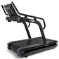 Spirit CTSBS900 black sled treadmill with digital display console, curved handles, and textured running surface on white back