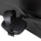 Black stationary bike pedal with textured footplate and adjustable strap attached to exercise equipment