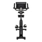 Spirit CU1000ENT black upright exercise bike with digital console, curved handlebars, and pedals with straps, front view on w