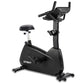 Black Spirit upright stationary bike with padded seat, digital display console, curved handlebars, and foot pedals on white b