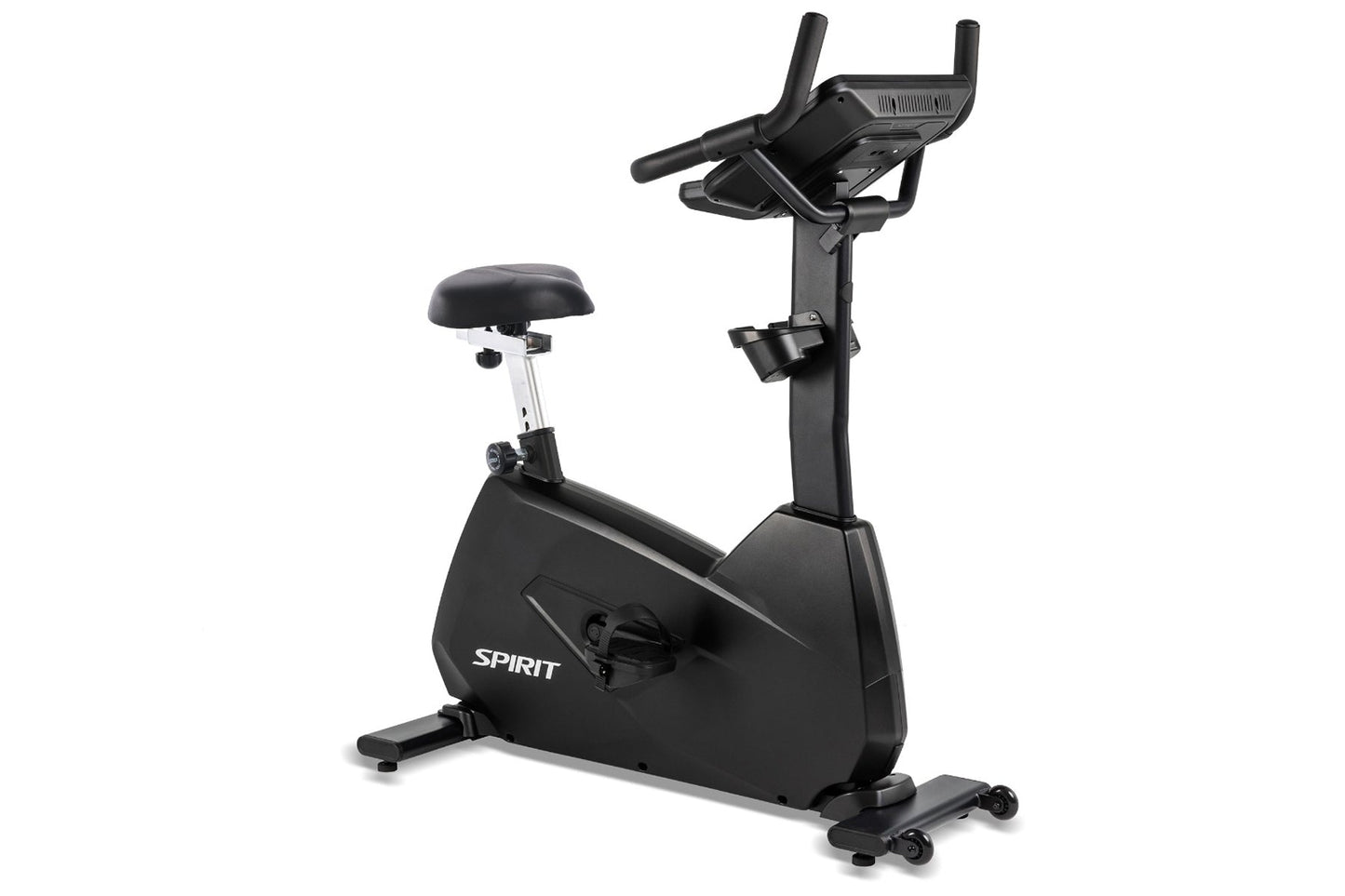 Black Spirit upright stationary bike with padded seat, digital display console, curved handlebars, and foot pedals on white b