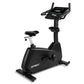 Spirit CU800 black upright stationary exercise bike with digital console, padded seat, and handlebars on white background