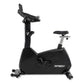 Spirit CU800ENT upright exercise bike with black frame, padded seat, handlebar console, and silver accents on white backgroun