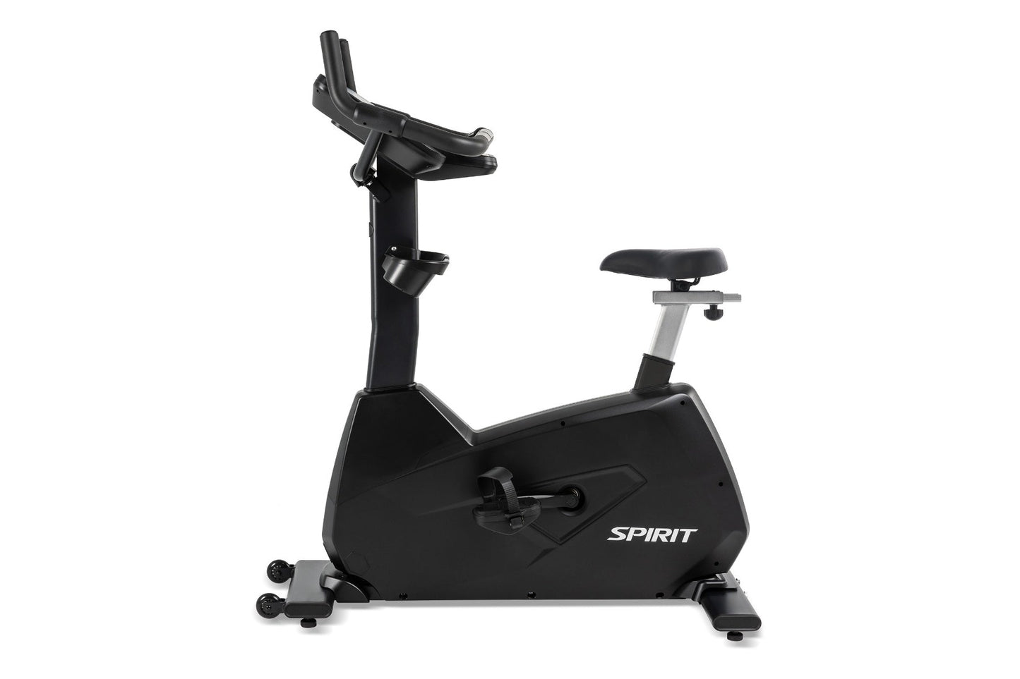Spirit CU800ENT upright exercise bike with black frame, padded seat, handlebar console, and silver accents on white backgroun