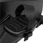 Black foot pedal with textured platform and adjustable strap on exercise bike