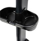 Black plastic cup holder attached to upright exercise bike frame, mounted on vertical post