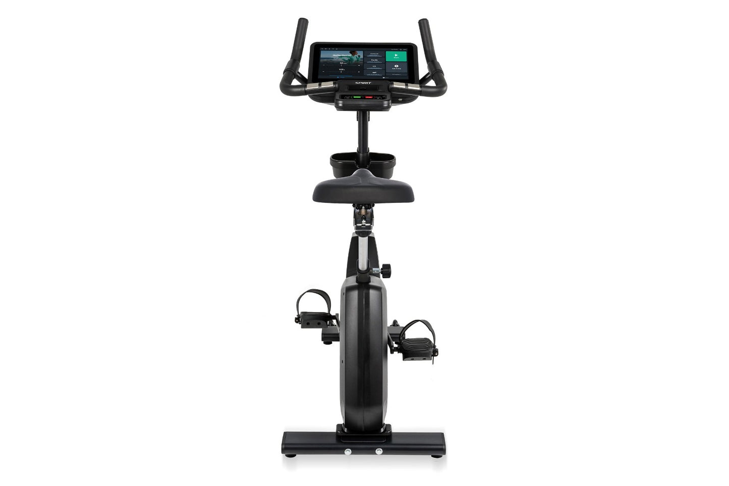 Black upright exercise bike with digital touchscreen console, dual handles, padded seat, and foot pedals with straps on white