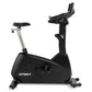 Spirit CU800ENT upright stationary bike with black frame, padded seat, silver adjustable post, and dual handlebar grips on wh