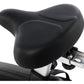 Black padded bicycle saddle with metal quick-release clamp mounted on seat post