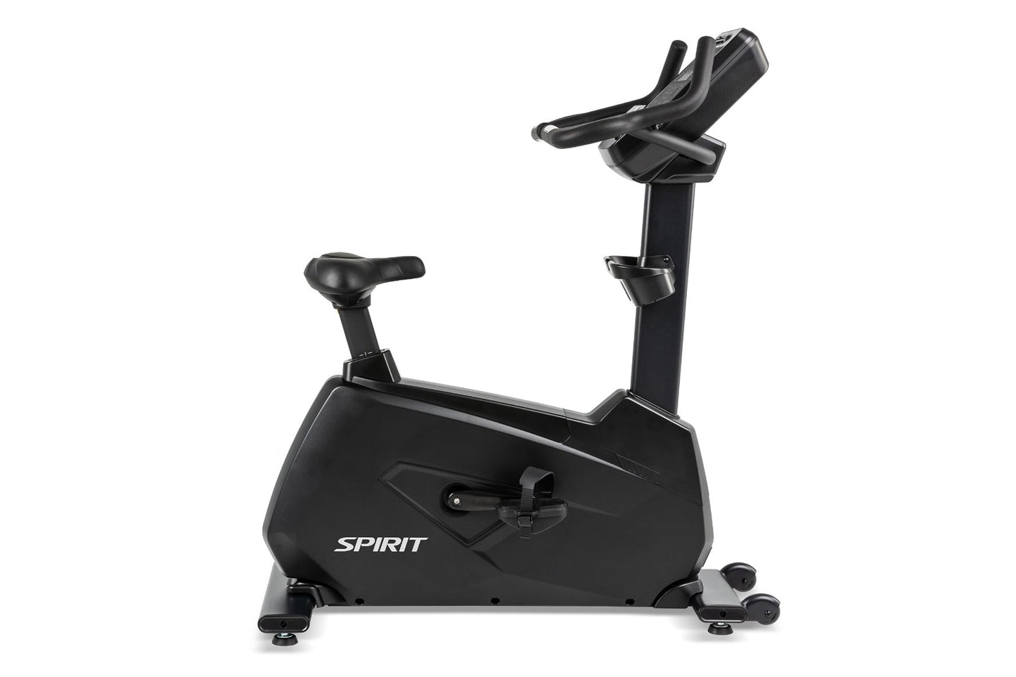 Spirit CU900 upright stationary bike with black frame, padded seat, adjustable handlebars, and foot pedals on white backgroun