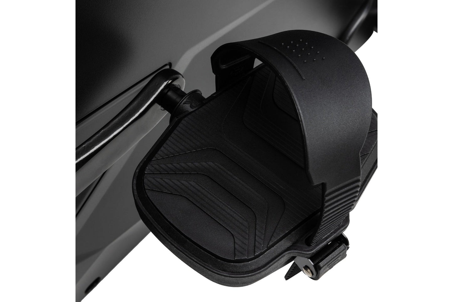 Black upright exercise bike seat with quilted padding and ventilation holes, mounted on metal frame