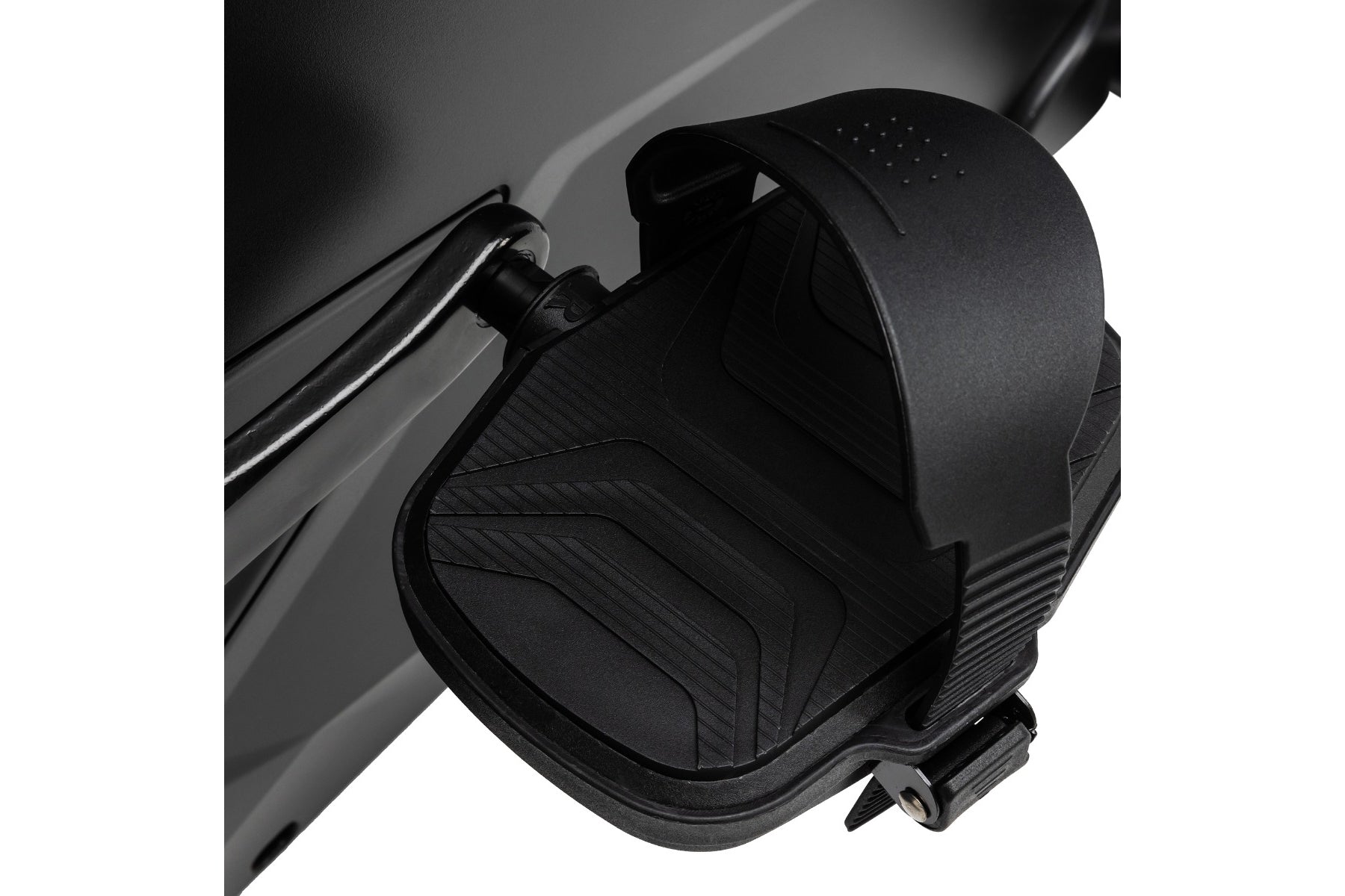 Black upright exercise bike seat with quilted padding and ventilation holes, mounted on metal frame