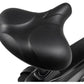Black padded contoured seat on upright stationary bike, close-up detail view on white background