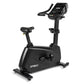 Spirit CU900 black upright stationary bike with digital console, seat, and handlebars on white background