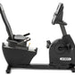 Spirit XBR25 black recumbent exercise bike with padded seat, backrest, handlebars, and digital display console on white backg