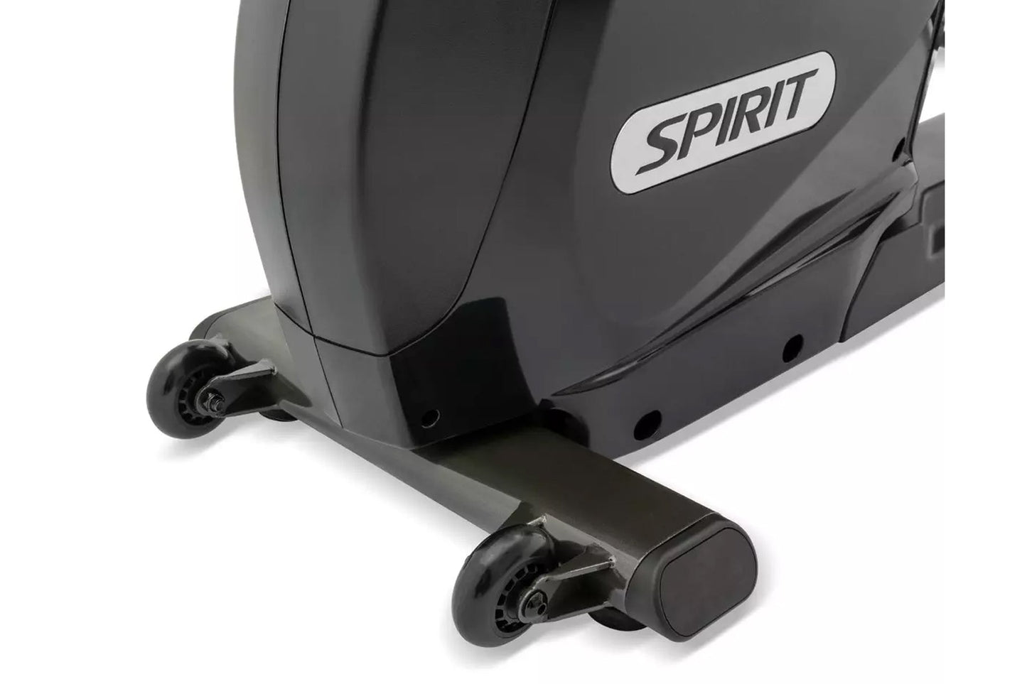 Spirit XBR95 recumbent exercise bike with gray padded seat, black footrest, and wheels on white background