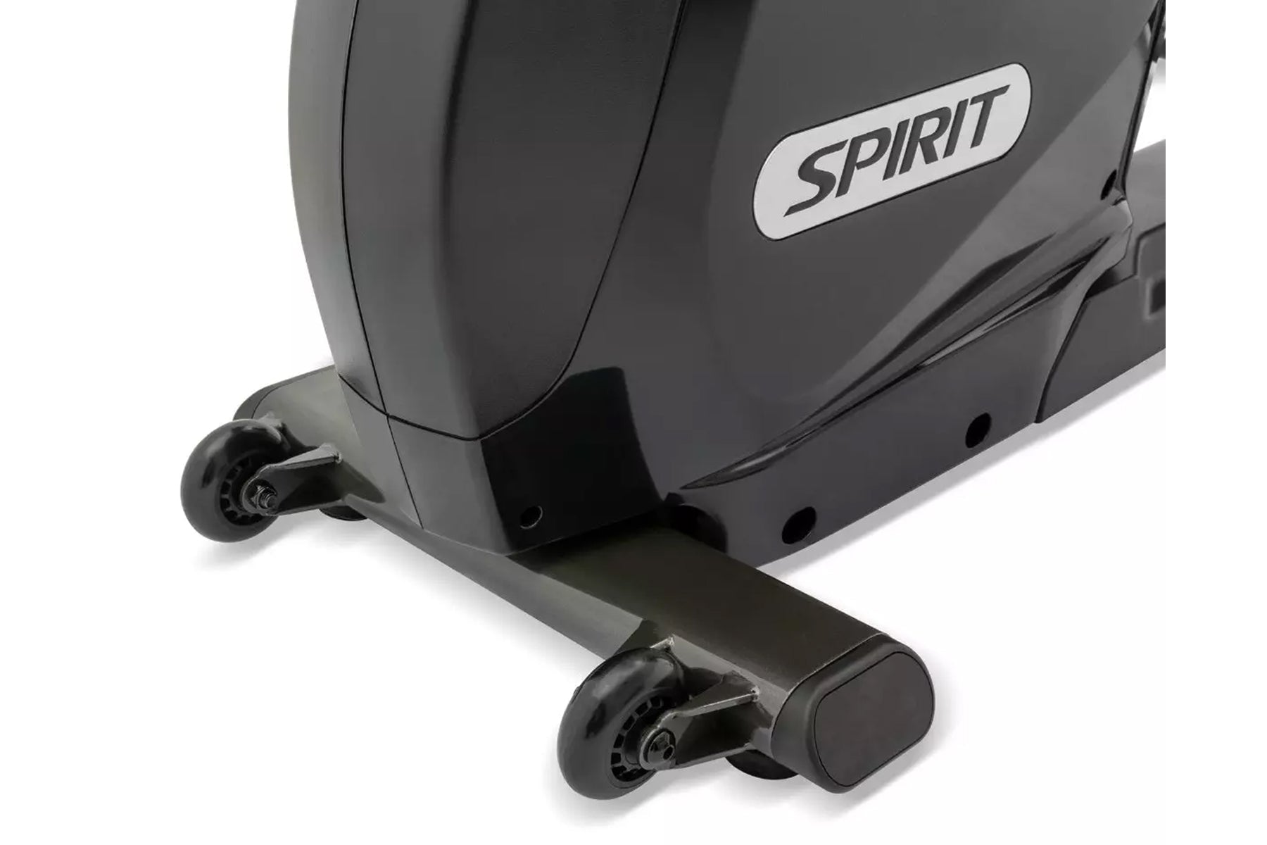 Spirit XBR95 recumbent exercise bike with gray padded seat, black footrest, and wheels on white background