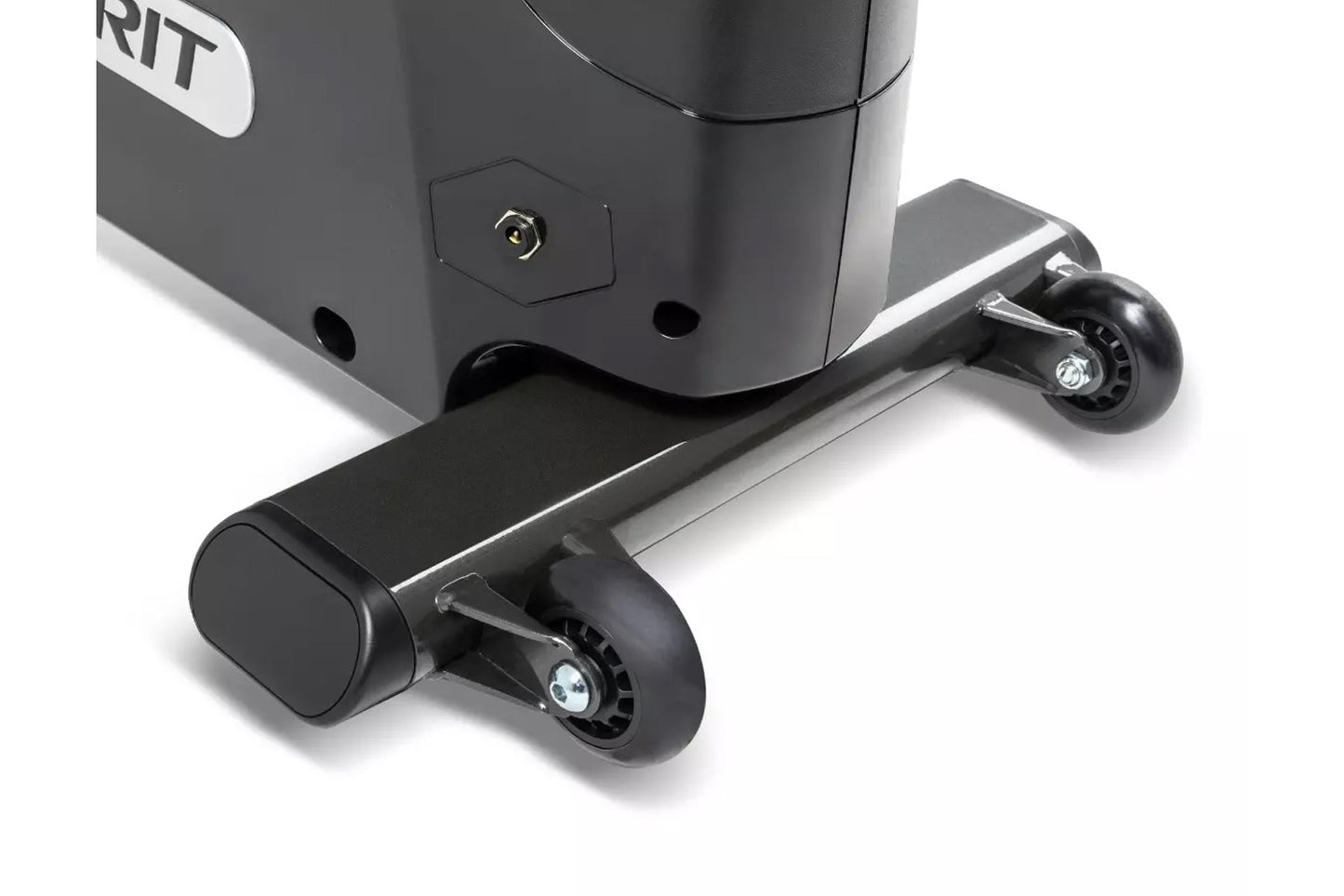 Close-up view of Spirit upright exercise bike base showing black frame with chrome accents, dual black wheels, and gold conne